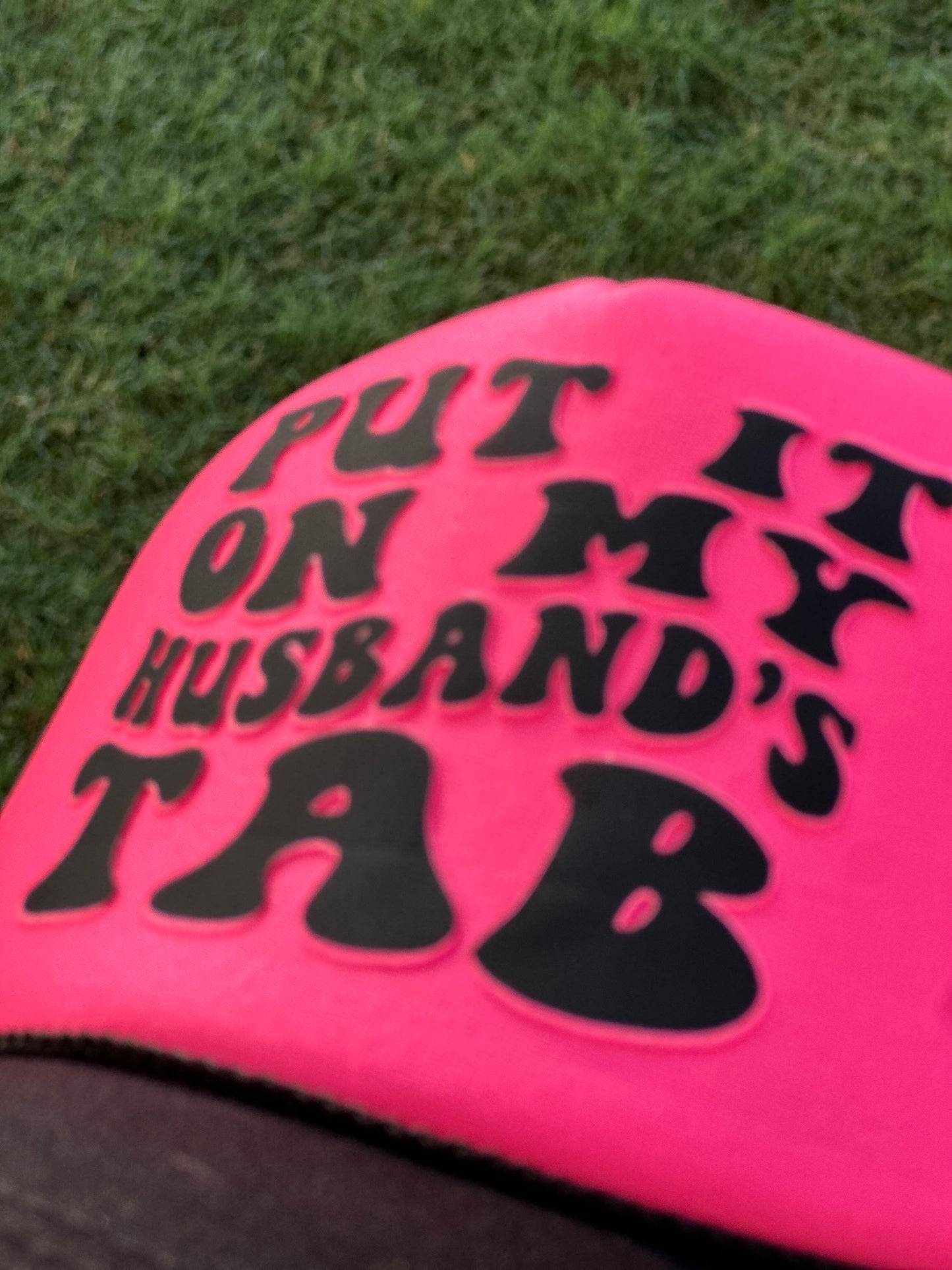 Put it on my Husbands Tab Trucker Hats